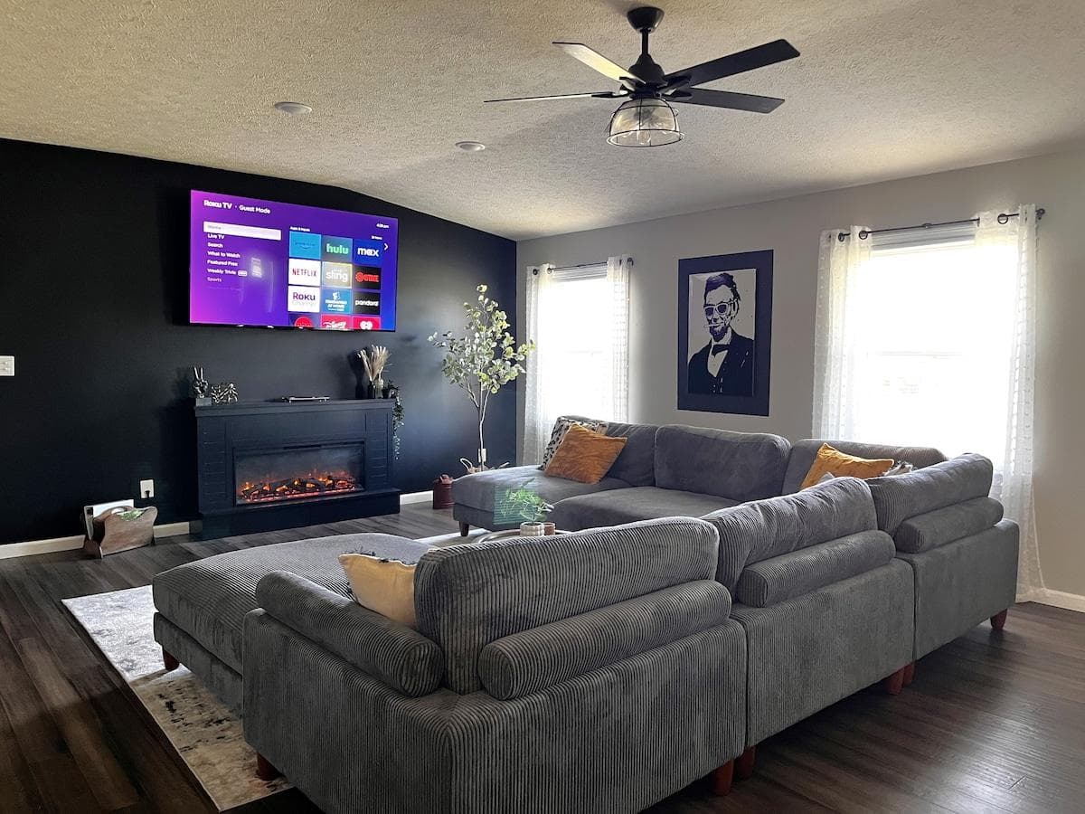 75 inch Roku streaming TV (with Guest Mode for automatic sign-out of your streaming services upon checkout), extra deep sectional sofa, and an electric fireplace that can emit heat if you so choose. Lincoln was born in KY!